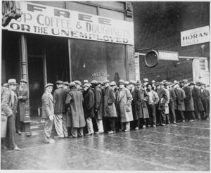 732px-Unemployed_men_queued_outside_a_depression_soup_kitchen_opened_in_Chicago_by_Al_Capone_02-1931_-_NARA_-_541927